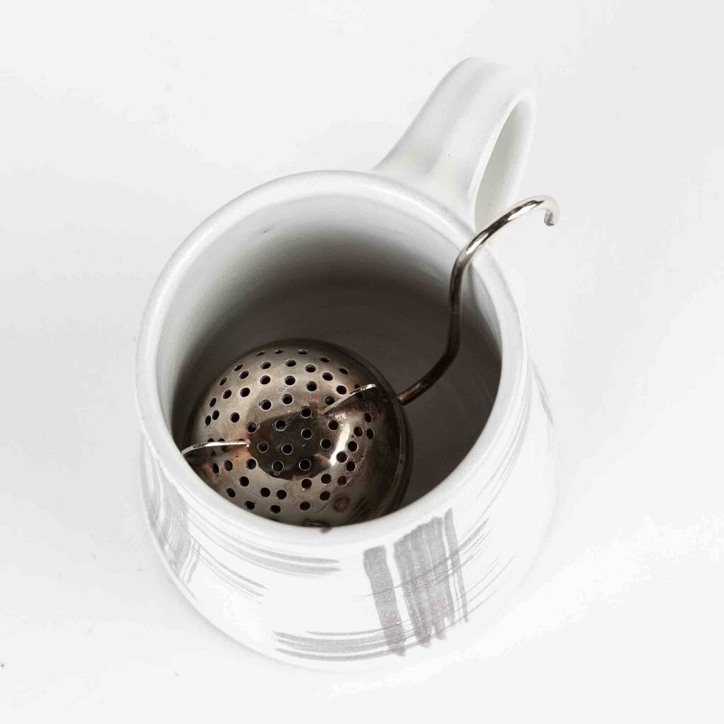 Ten Thousand Villages - Billee Standing Cat Tea Ball Infuser Ten Thousand Villages -better made easy-eco-friendly-sustainable-gifting